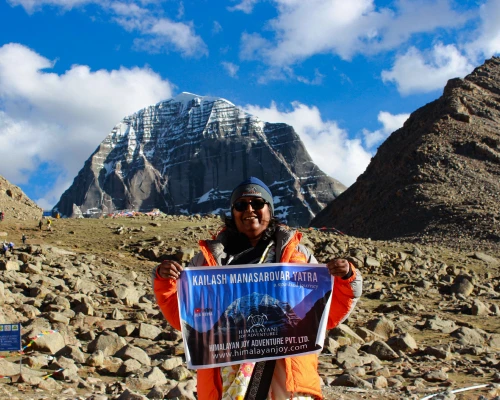 A Pilgrim Is Taking A Picture In Kailash North Face