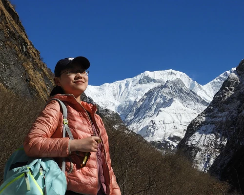 Trekker And Mount Gangapurna